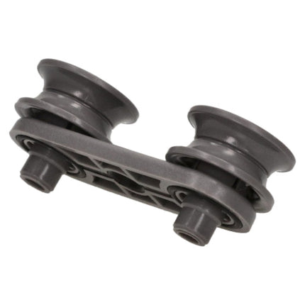 A dark gray plastic dual pulley system component, likely an automotive or mechanical part, shown on a plain white background.