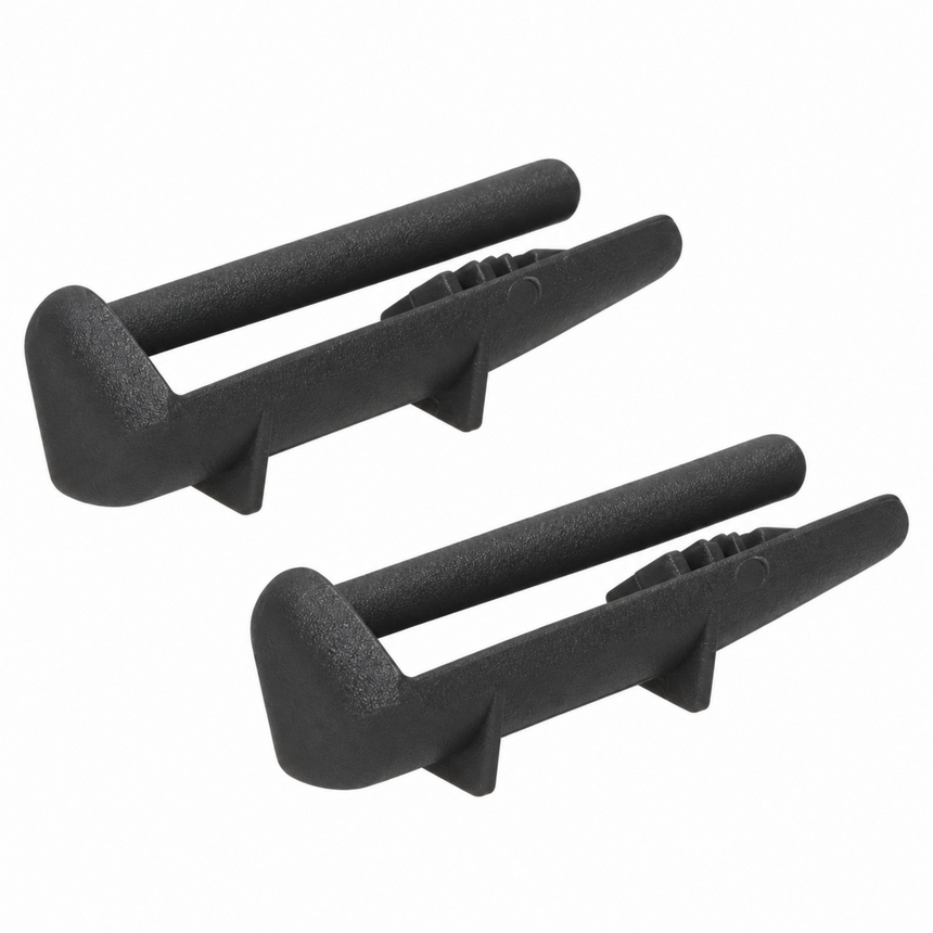 Two black textured plastic or rubber door stopper guards shown on a plain white background.