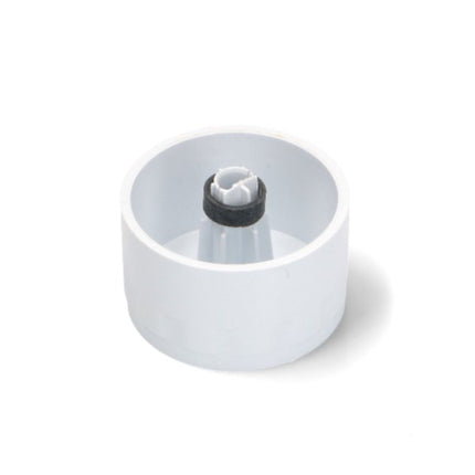 White plastic component with a black cap on a white background