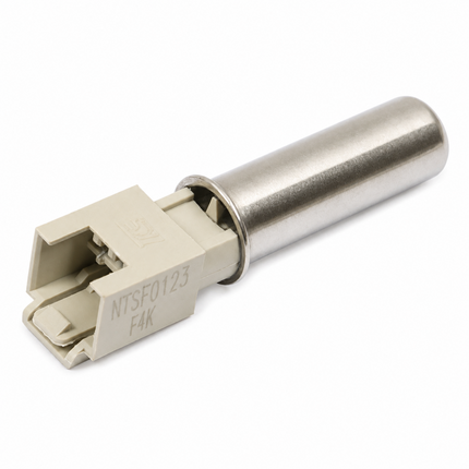 A small cylindrical metal component with a beige plastic connector housing, photographed on a plain white background. The connector has printed text reading 'NTSF0123 F4K'.