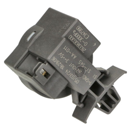 A dark gray plastic automotive relay component with printed white technical specifications and a small brass screw terminal, shown on a plain white background.