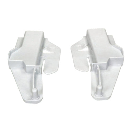 Two white plastic clips on a white background