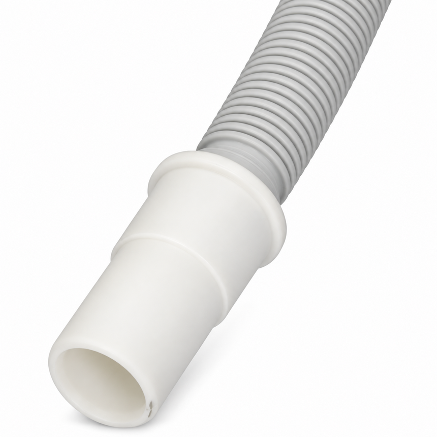 A close-up of a white plastic pipe connector joining a gray corrugated flexible hose on a white background.