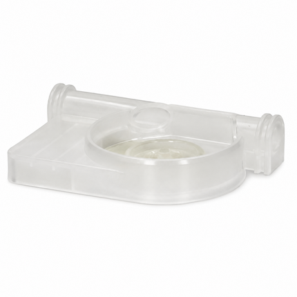 Clear plastic component on a white background