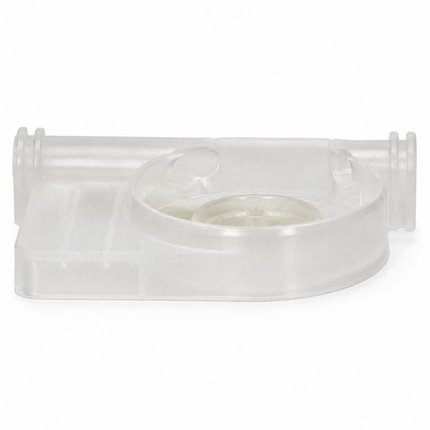 Clear plastic component on a white background