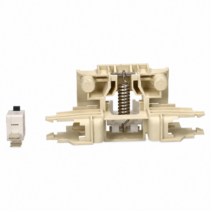 A beige plastic mechanical switch component with a metal coil spring, shown on a white background alongside a small matching switch module.