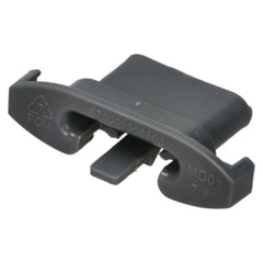 A dark gray molded plastic component with embossed markings including 'POM', a recycling symbol, and 'MD01 7/8' on a plain white background.