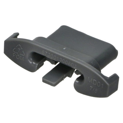 A dark gray molded plastic component with embossed markings including 'POM', a recycling symbol, and 'MD01 7/8' on a plain white background.