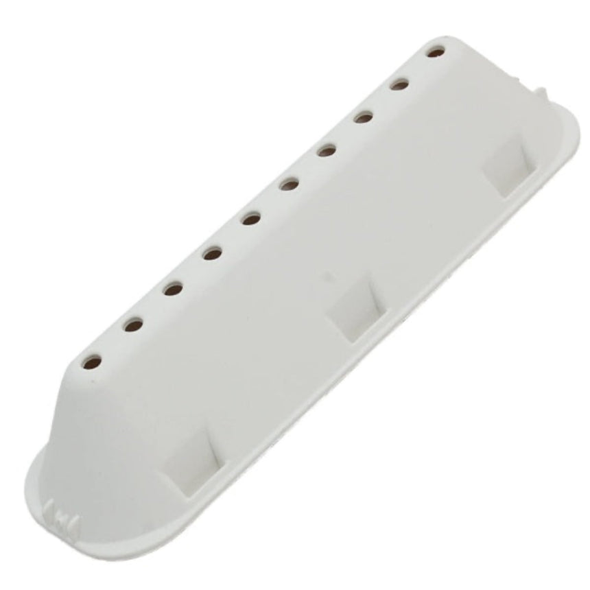 White plastic component with multiple holes on a white background