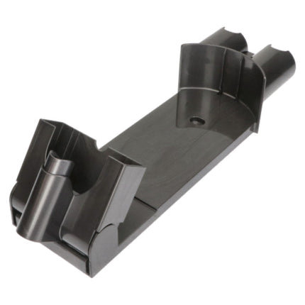 A black plastic mounting bracket or clip with a flat rectangular base and two angled support arms, shown on a plain white background.