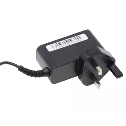 Black power adapter with UK plug on a white background