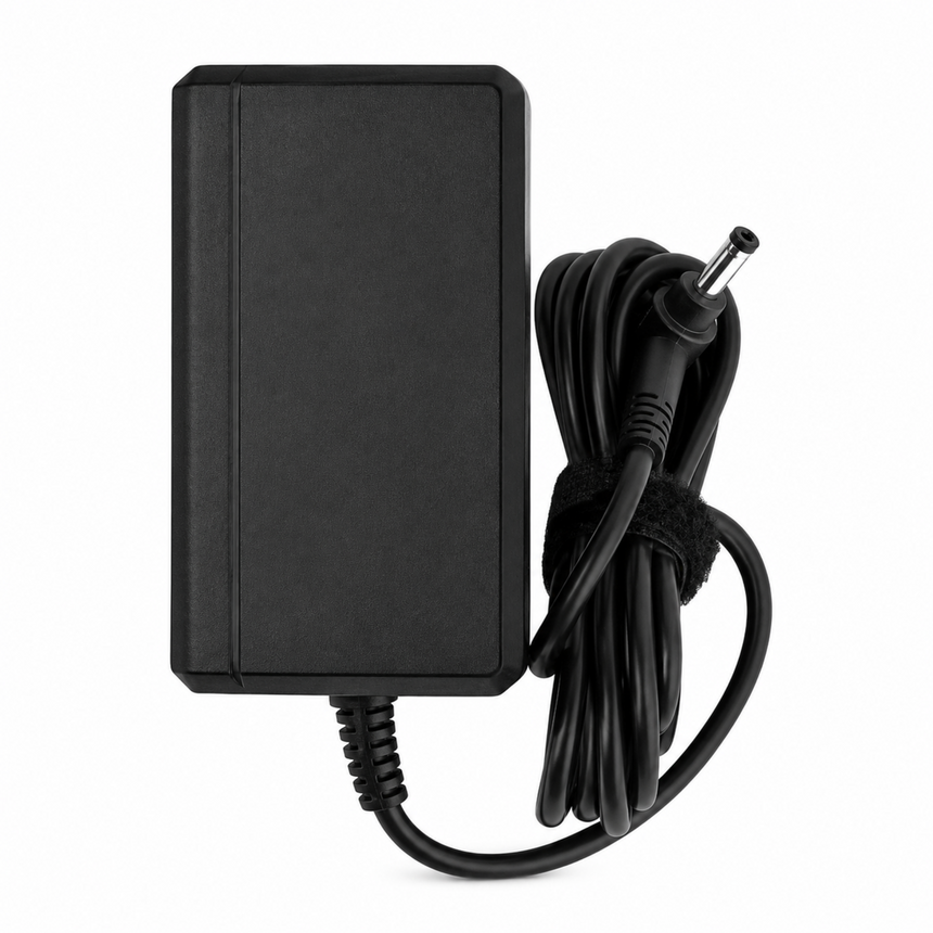 Black power adapter with a cord on a white background