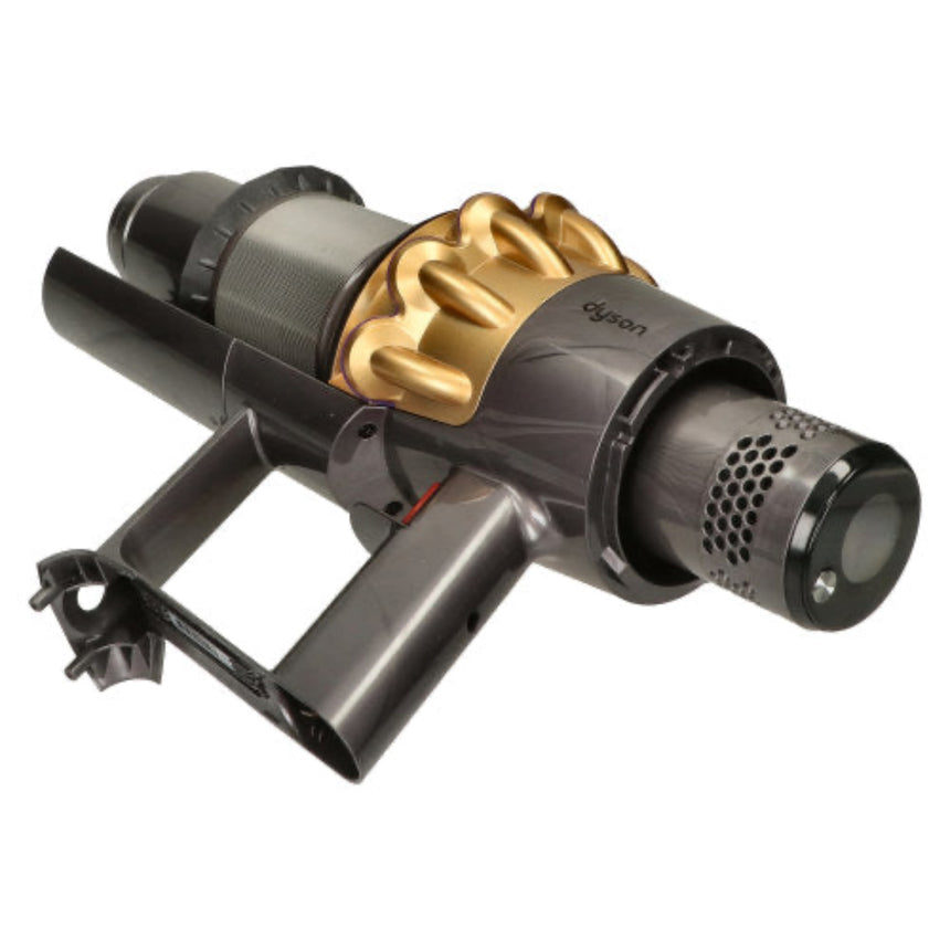 A Dyson cordless vacuum cleaner attachment head, featuring a dark gray and black plastic body with a prominent metallic gold cyclone component, shown on a solid white background.