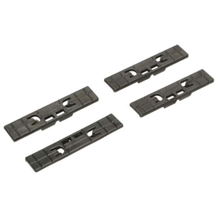 Four black plastic strips on a white background