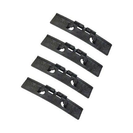 Four black metal brackets on a white background