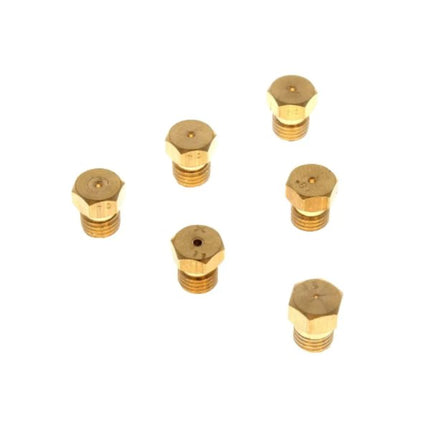 Set of six brass nozzles on a white background