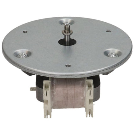 A circular brushed DC motor with a silver metal top plate, four mounting holes, a central threaded shaft, and a copper-colored wire-wound stator core with white plastic terminal covers, shown on a plain white background.