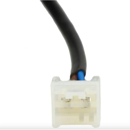 Close-up of a wiring connector with black and blue wires on a white background