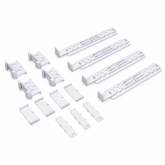 A set of white plastic mounting brackets and clips arranged on a plain white background.