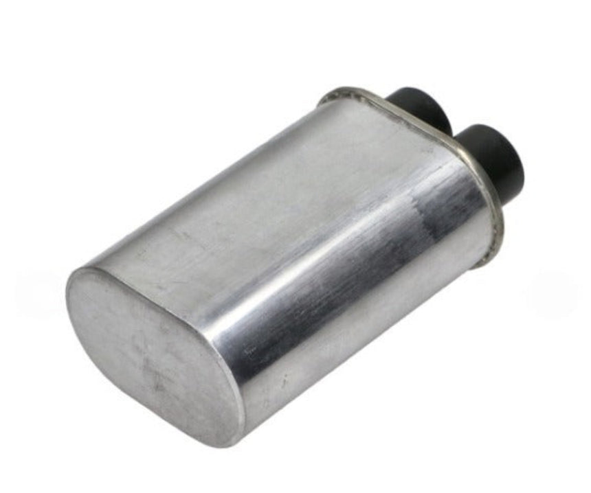 A cylindrical metallic automotive part, likely an aluminum fuel pump module, featuring a brushed silver finish and two black plastic connectors on one end, isolated on a white background.