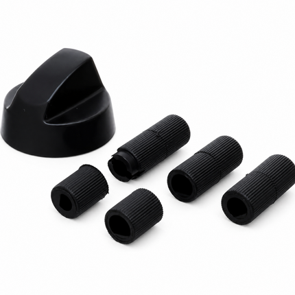 Set of black plastic components on a white background