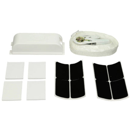 Collection of white and black adhesive patches on a white background