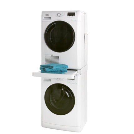White stacked washer and dryer set with a blue towel on the dryer door.