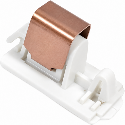 Copper coil in a white plastic holder on a white background