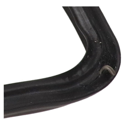 Close-up of a black rubber gasket on a white background